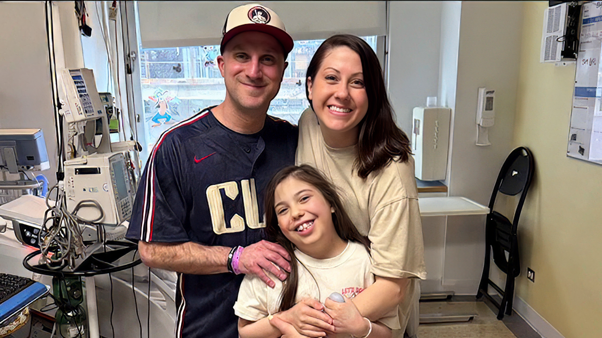 AVA COOPER received for the heart transplantation with her parents
