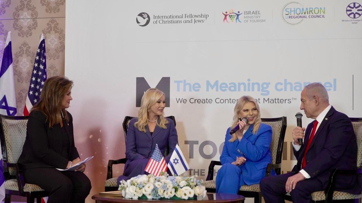 Pastor Paula White-Cain, spiritual advisor to President Donald Trump and head of the White House Office of Faith and Antisemitism (sitting next to Sara Netanyahu) meets Prime Minister Benjamin Netanyahu and his wife Sara at Daystar's "Together As One" event in Jerusalem, as part of a visit organized by Niv Jacobi, President of The Meaning Channel.