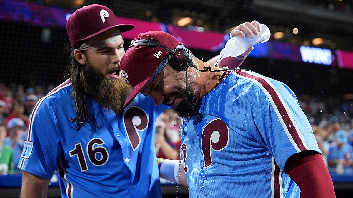 Brandon Marsh and Kyle Schwarber celebrate