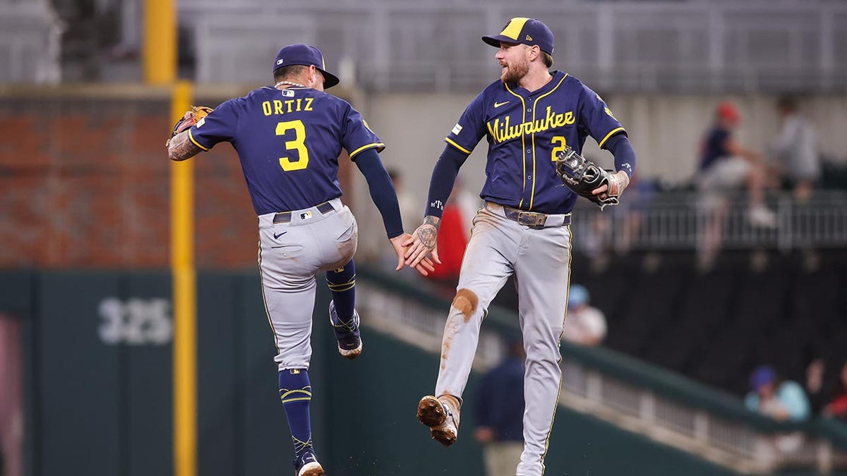 Brewers players celebrate win over Braves