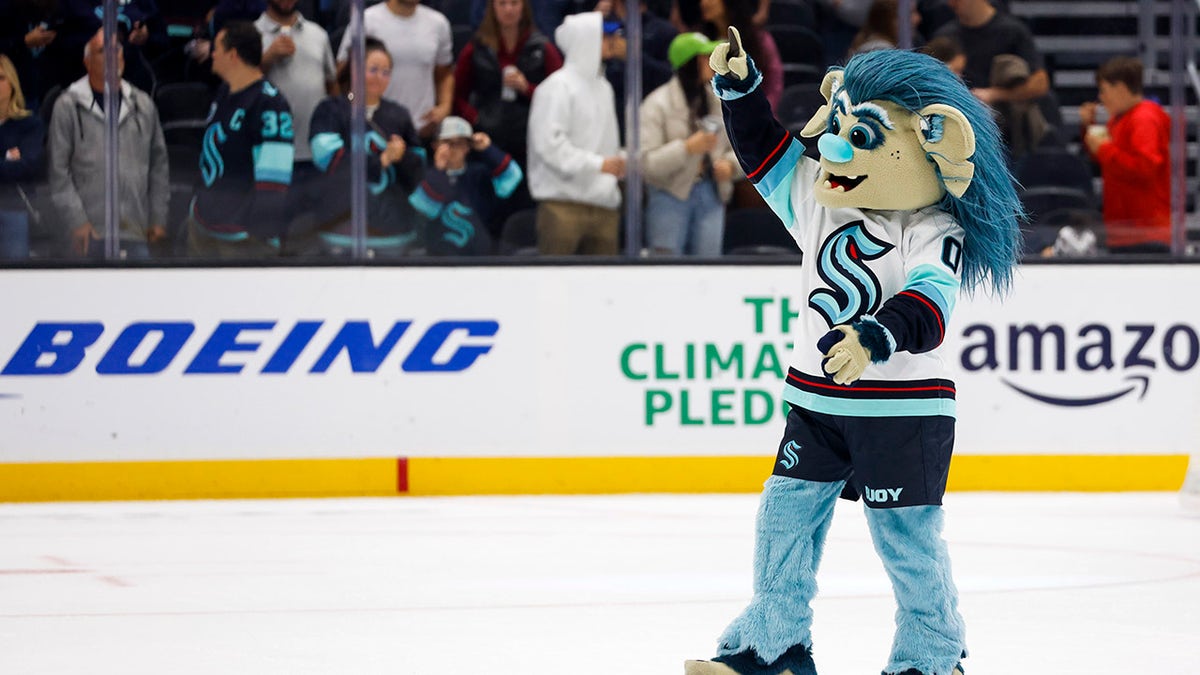 Seattle Kraken mascot Buoy celebrates
