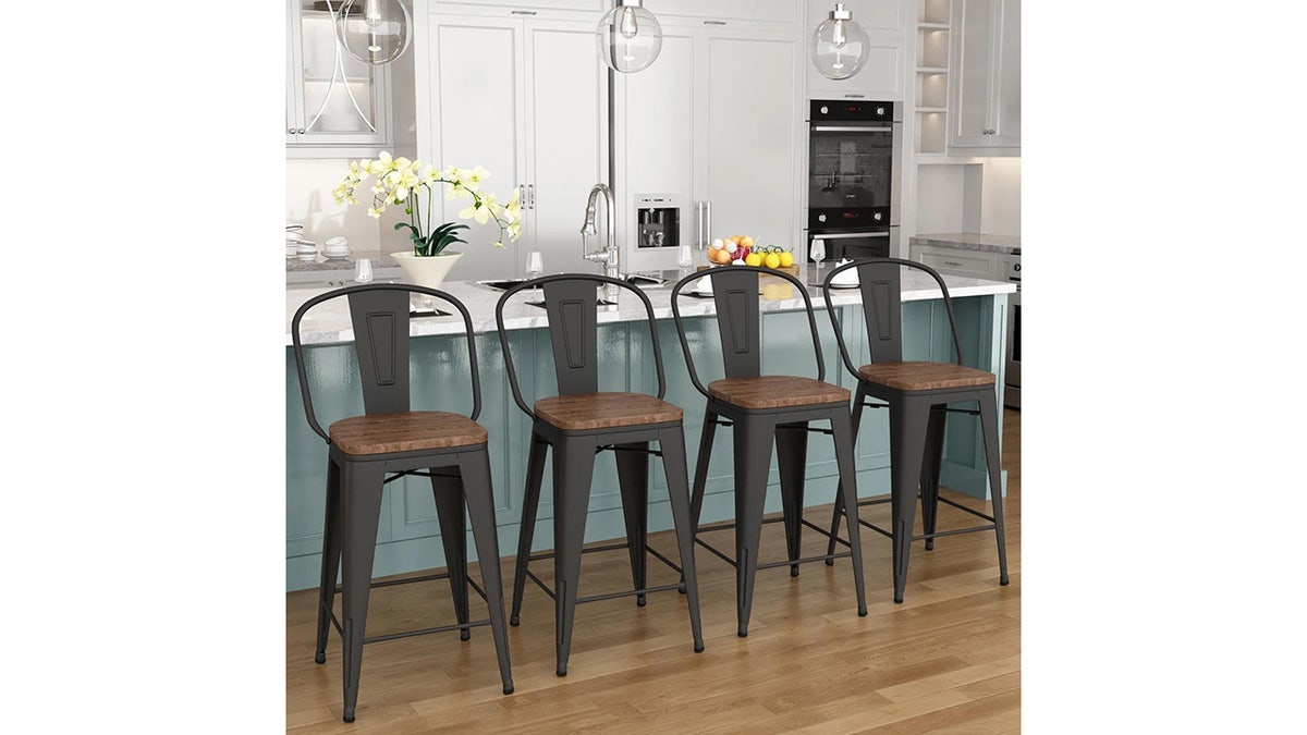 Sturdy wood and metal stools give you extra seating in your kitchen or dining room. 
