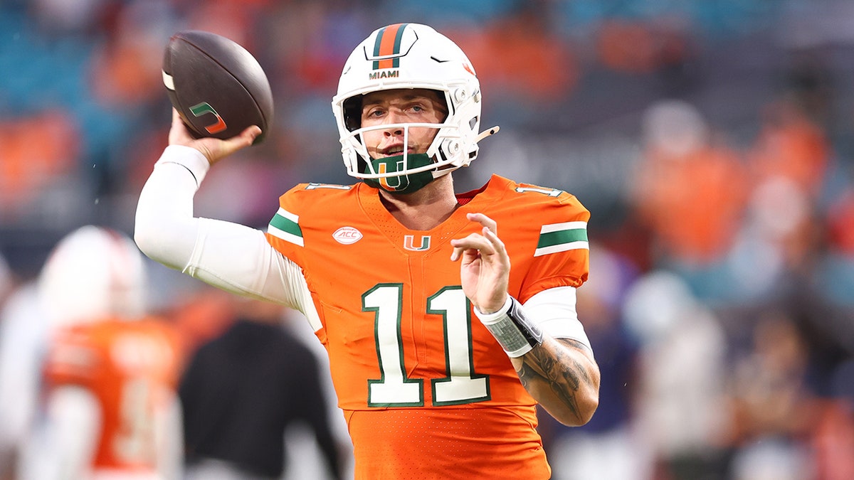Carson Beck throws pass