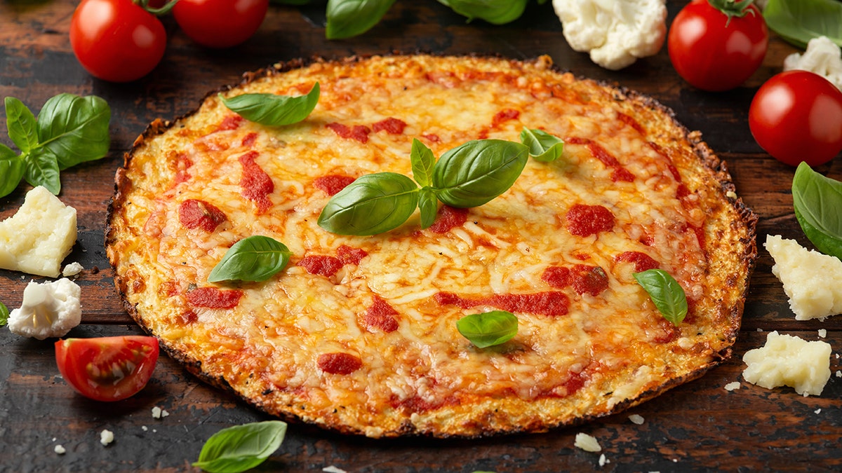 A cauliflower crust pizza is shown.