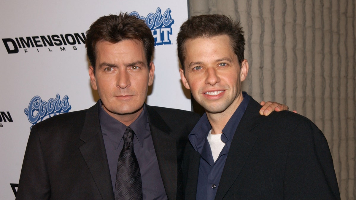 Charlie Sheen and Jon Cryer at a movie premiere