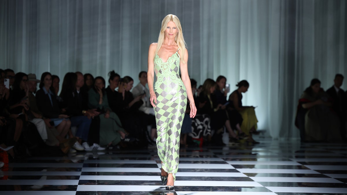 Claudia Schiffer walks the runway in Italy