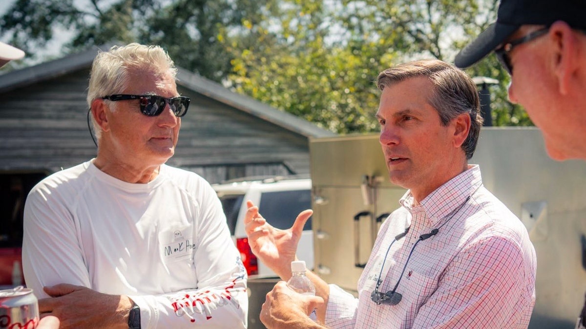 Former Tennessee football coach Derek Dooley spoke to supporters at a tailgate rally on Saturday.