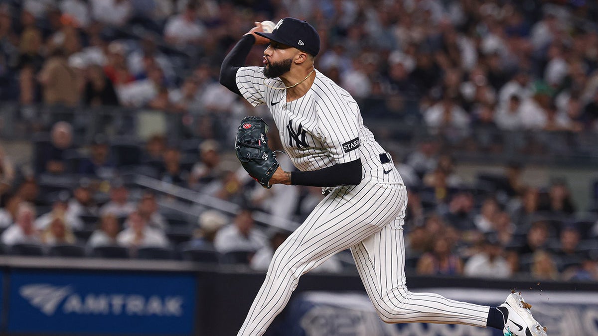 Devin Williams pitches