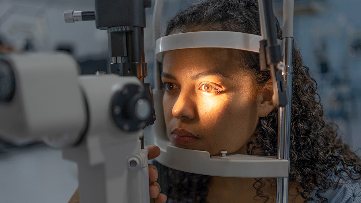 woman gets eye exam
