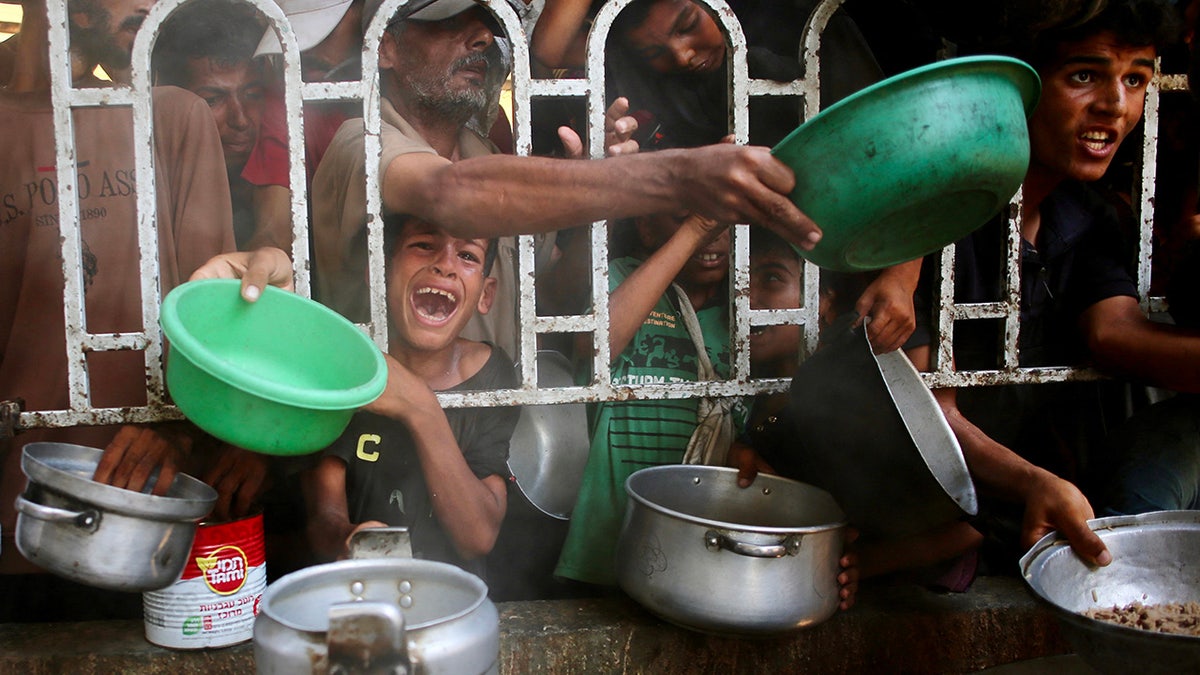 Gazan with vessels, trying to get food