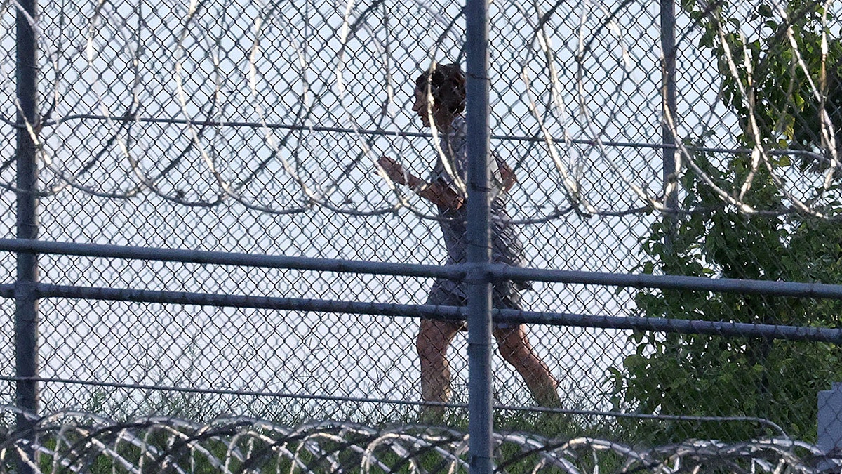 Ghislaine Maxwell was seen behind the barber wire in prison