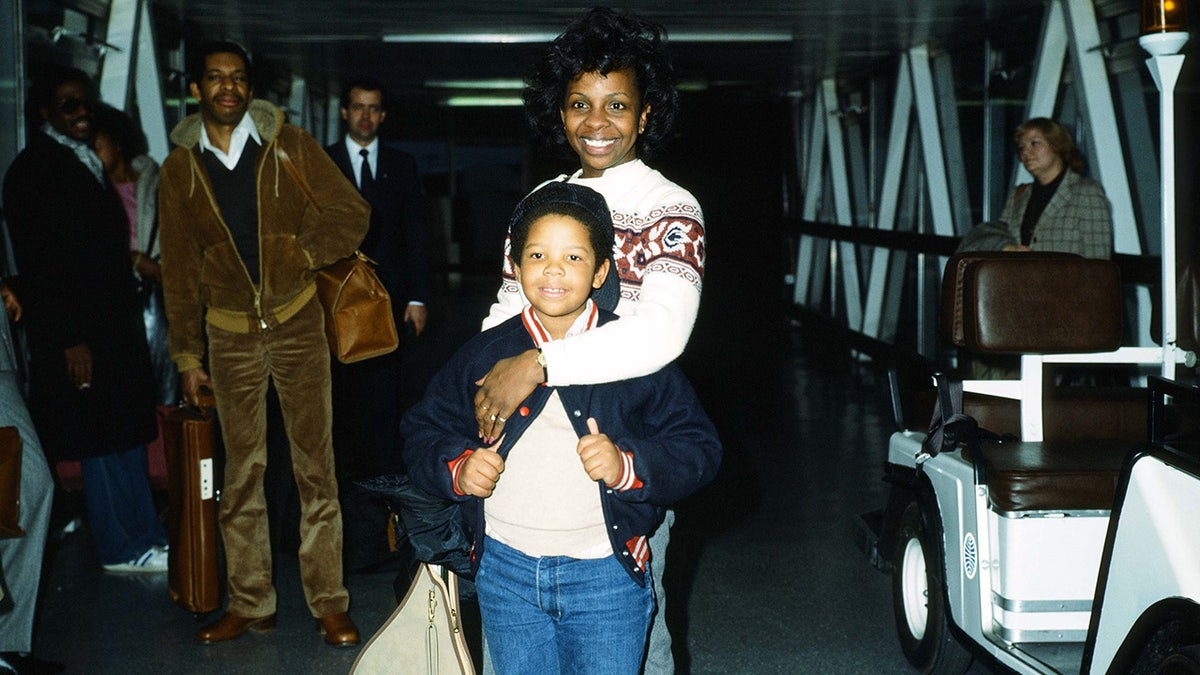 Gladys Knight hugs her son