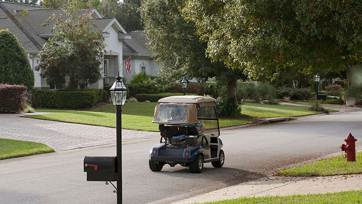 golf cart driving traffic