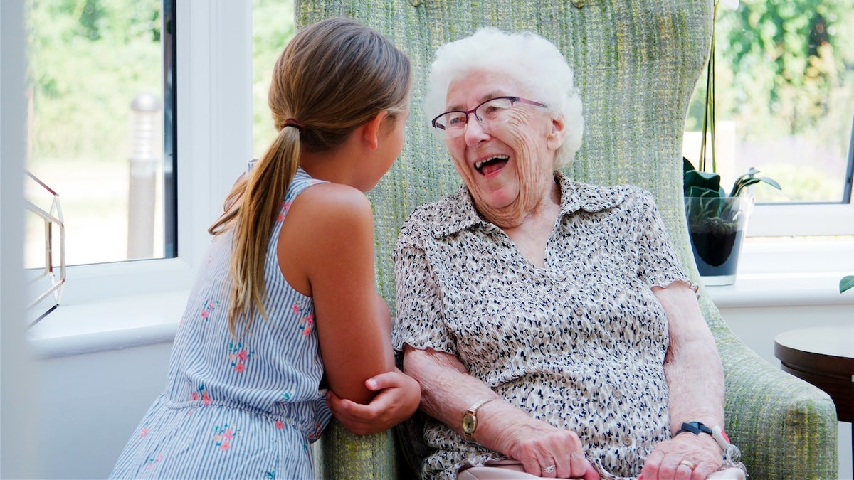 Elderly woman with granddaughter