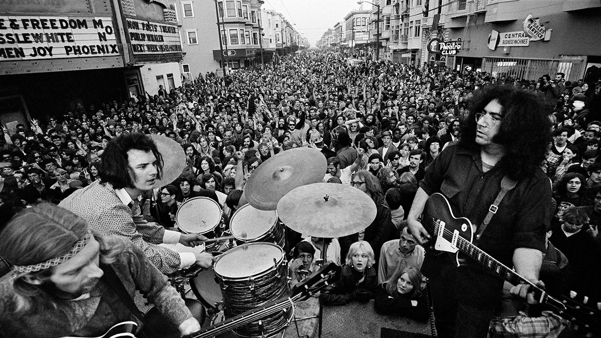 The Grateful Dead performing to a massive crowd at Haight Street