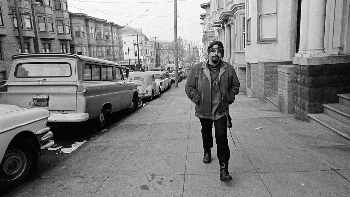 Pigpen walking the streets of San Francisco alone.