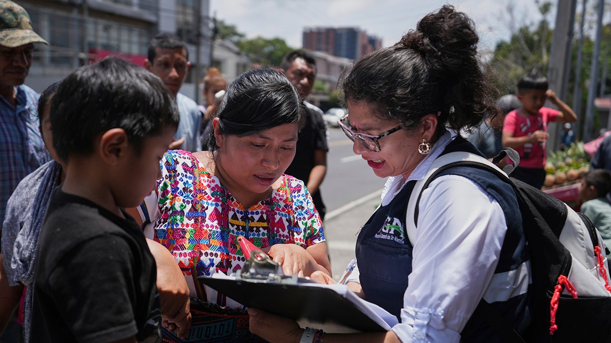 Guatemalan families wait for repatriation flights