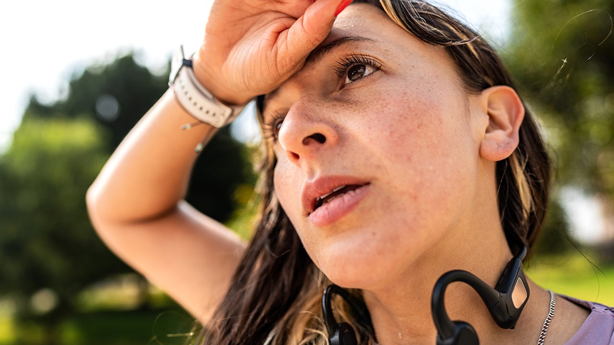 Woman exhausted in the heat