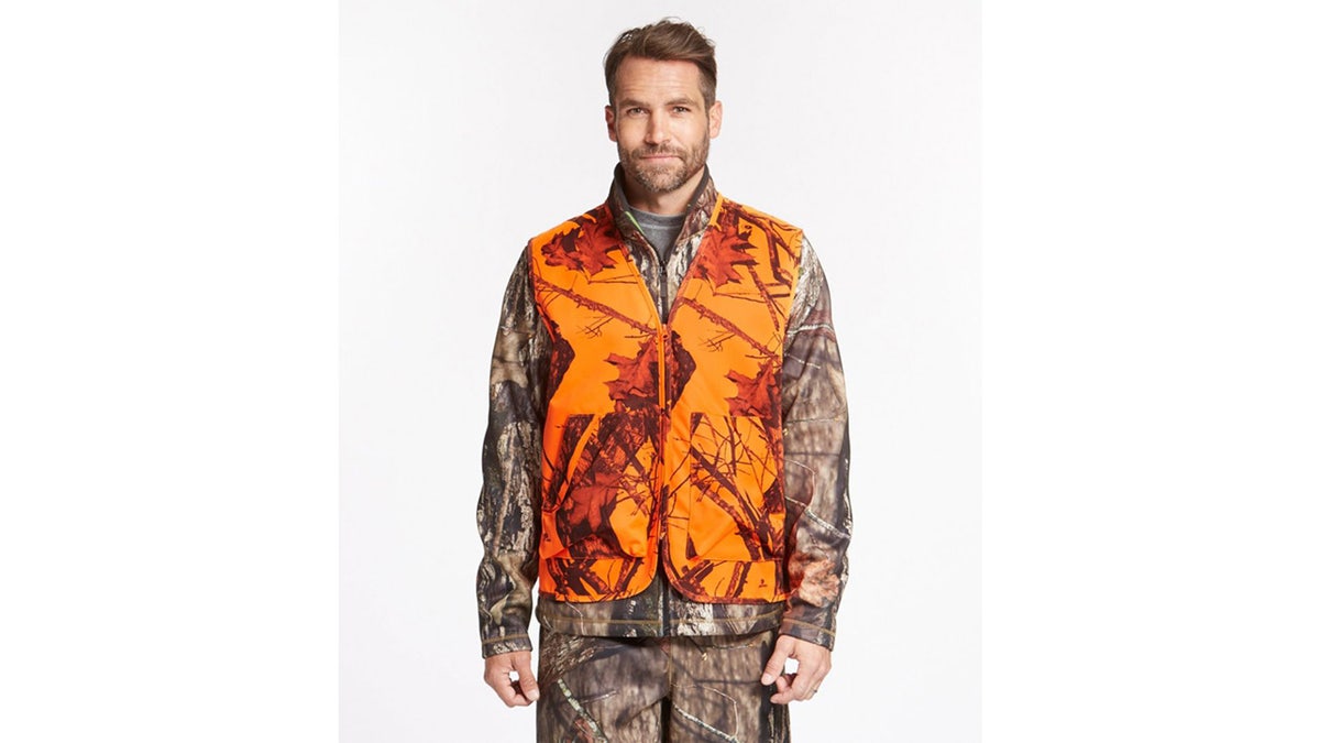 A lightweight orange vest with a camo pattern.