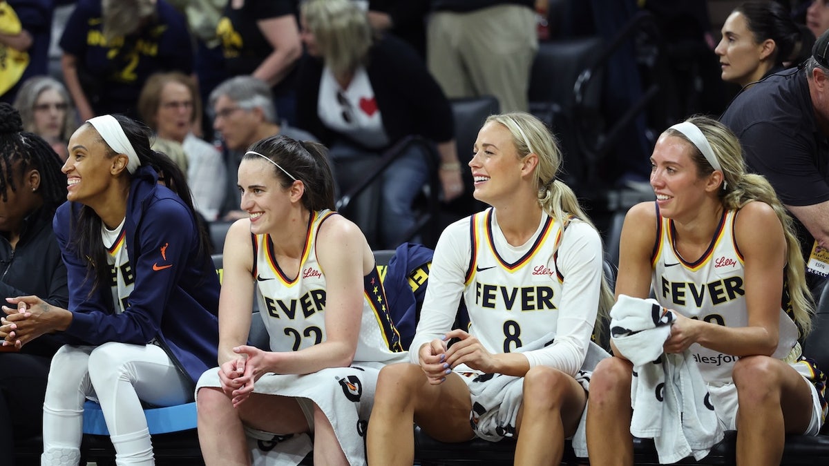 DeWanna Bonner Sophie Cunningham and Lexie Hull of the Indiana Fever smile during the game against the Brazil Women's National Basketball Team during the WNBA preseason game on May 4, 2025 at Carver-Hawkeye Arena in Iowa City, Iowa.