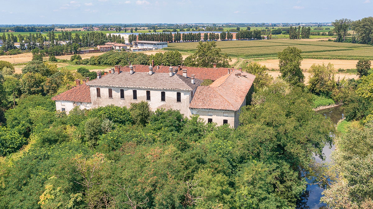 Historic medieval castle near Milan available but needs restoration work 5 Aerial shot of Landriano castle, medieval moat