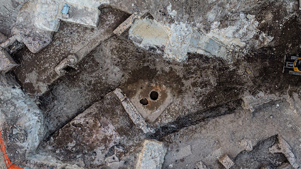 Aerial image of excavation site, structure remains