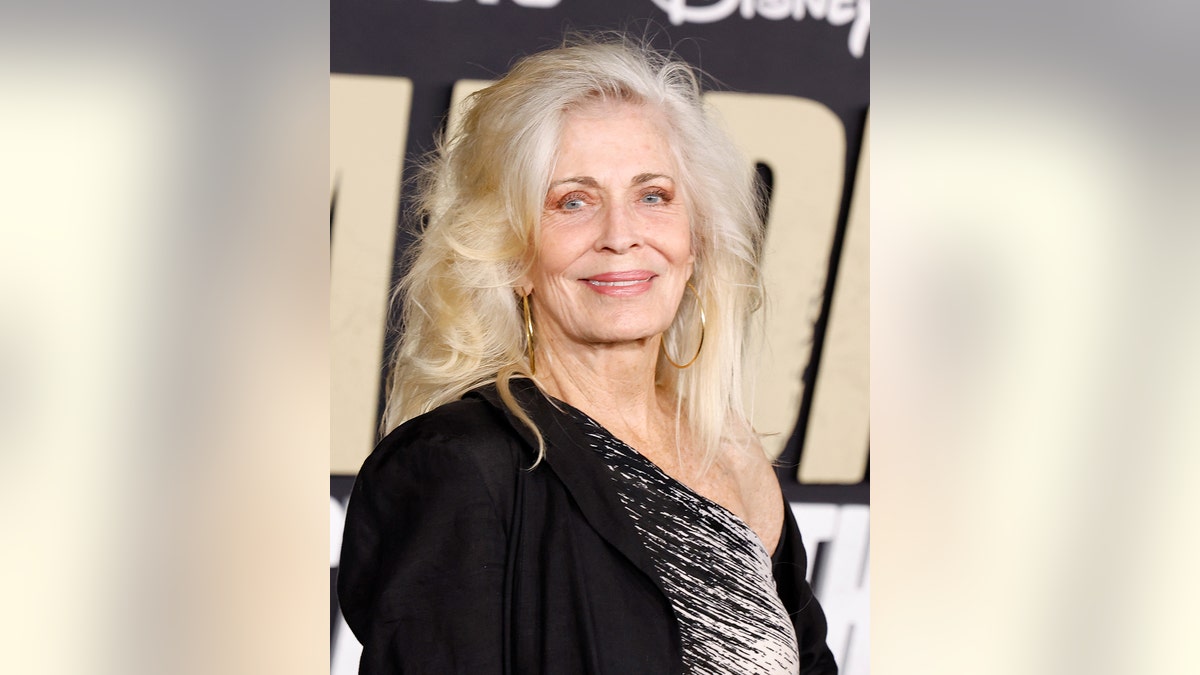 A close-up of Joanna Cassidy wearing black and smiling at the Los Angeles film premiere of "Road Diary."