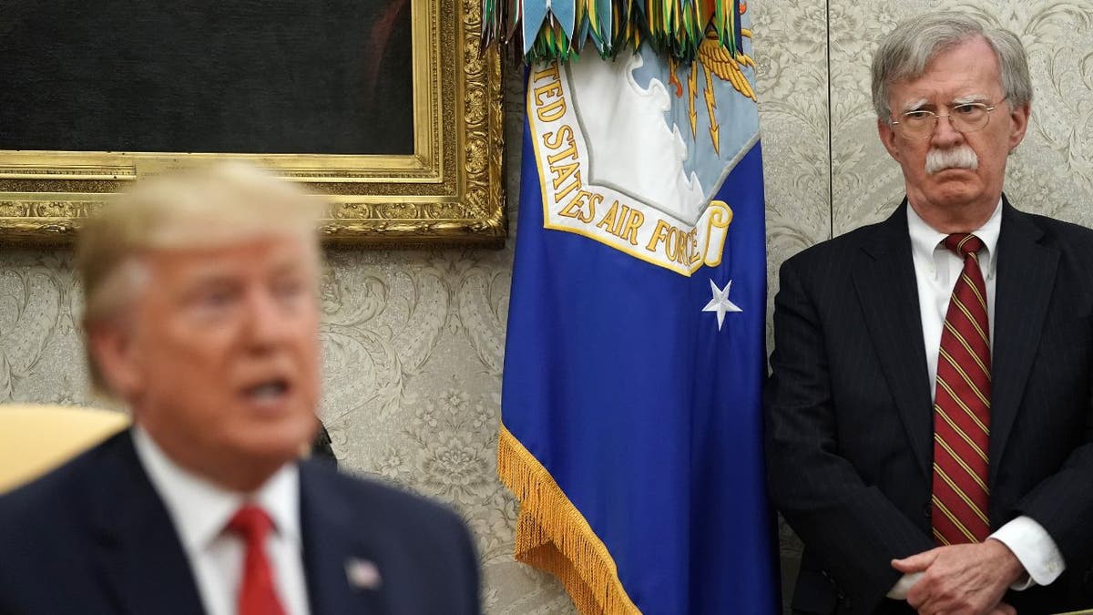 John Bolton and Donald Trump together