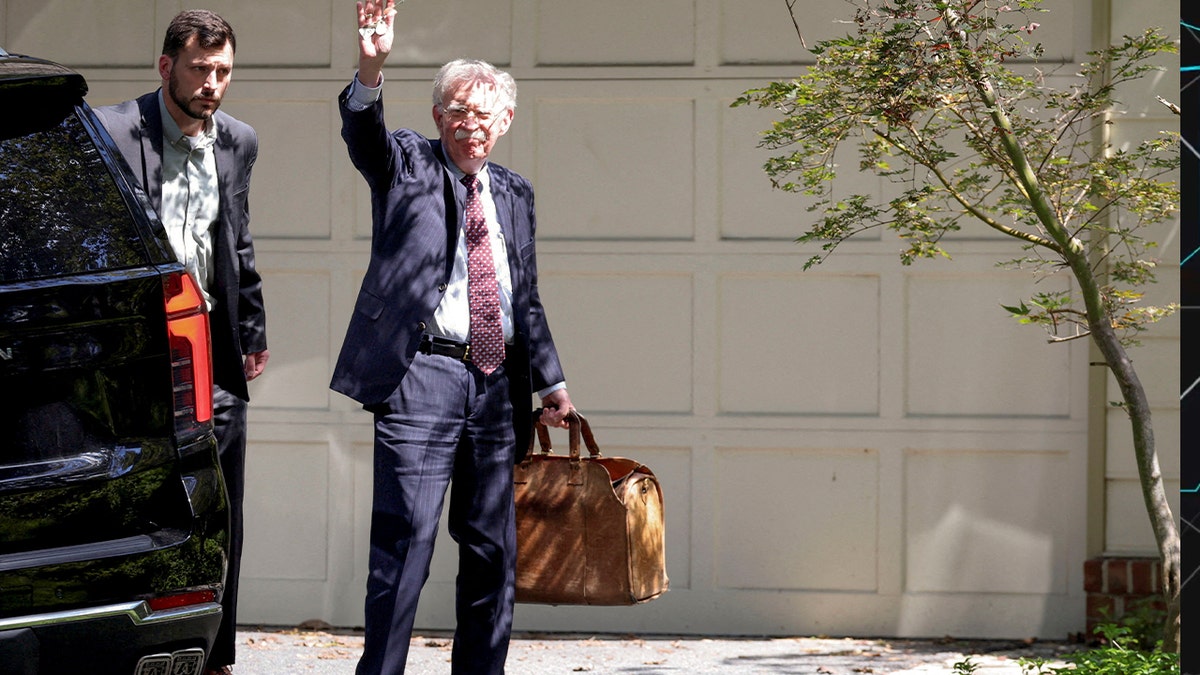 Former White House national security adviser John Bolton arrives at his house following its search by the FBI in Bethesda, Maryland, U.S., August 22, 2025.
