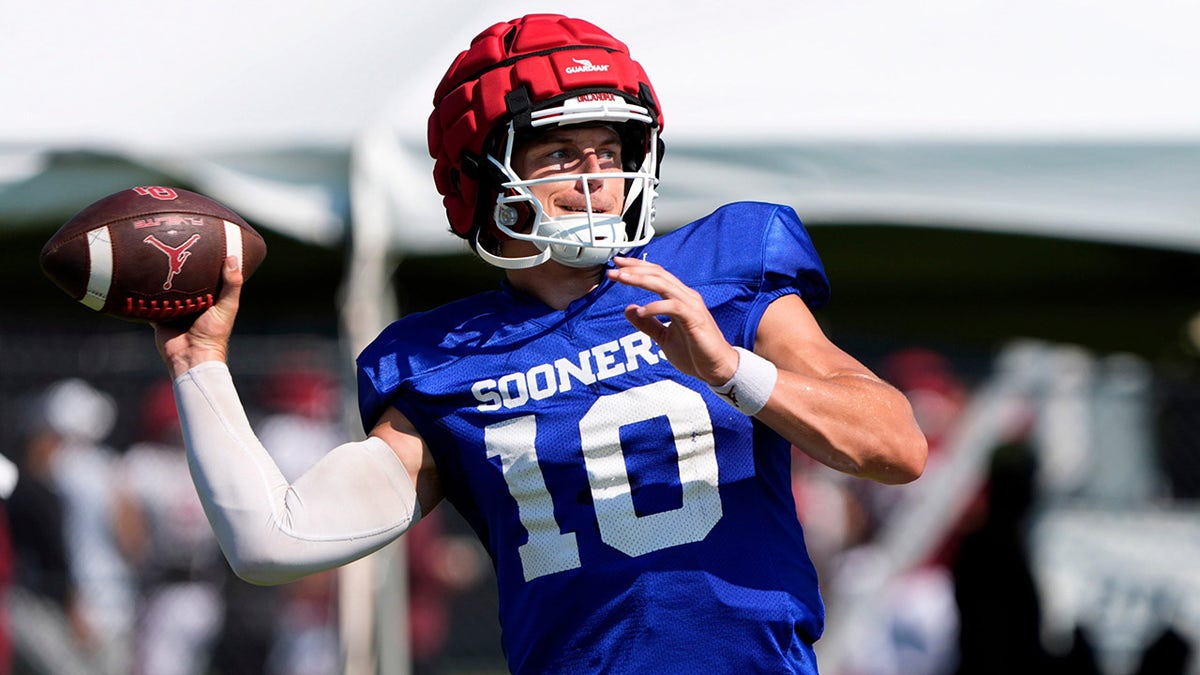 John Mateer throws football