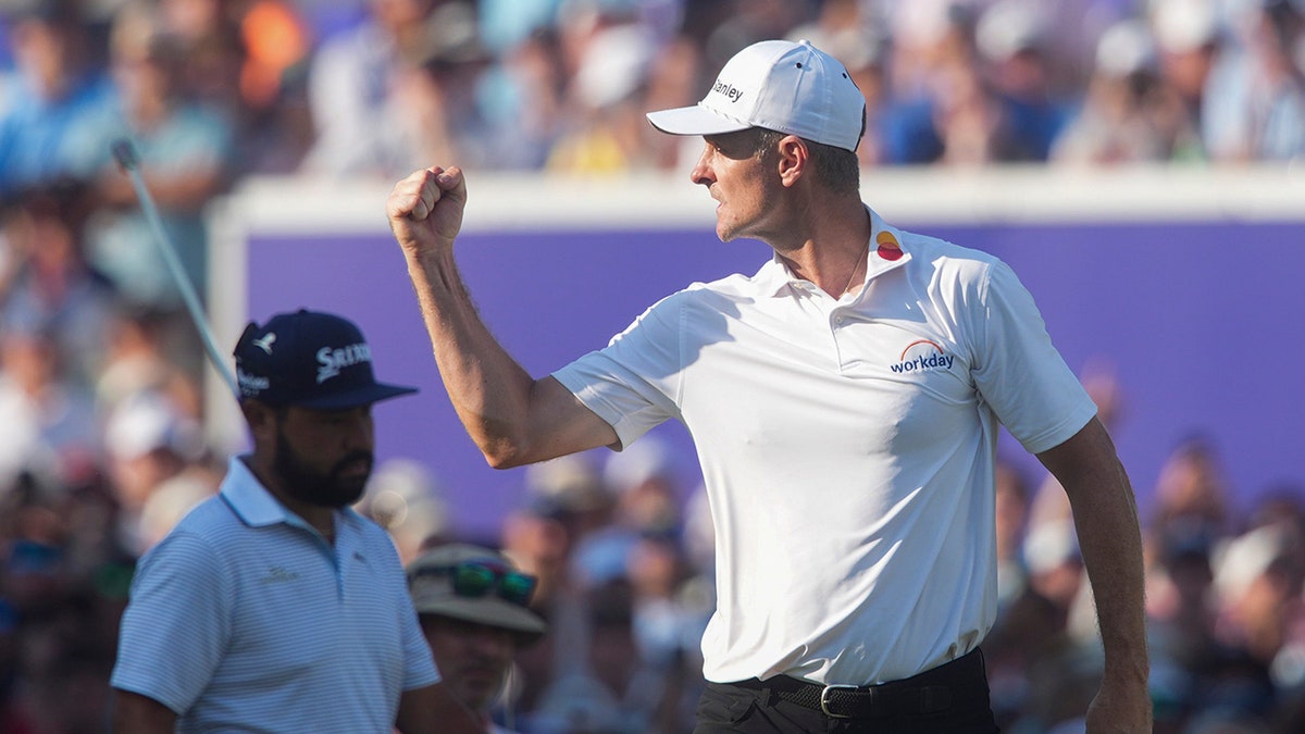 Justin Rose celebrates