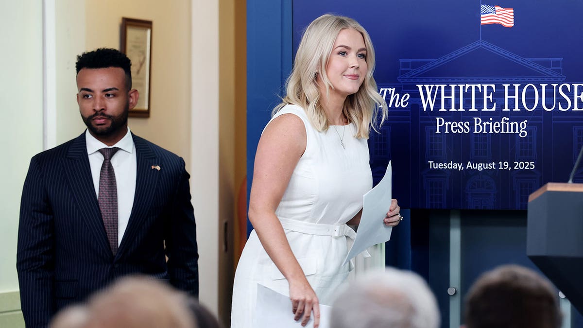 White House press secretary Karoline Leavitt arrives to a press briefing in the Brady Press Briefing Room at the White House on August 19, 2025 in Washington, DC. 