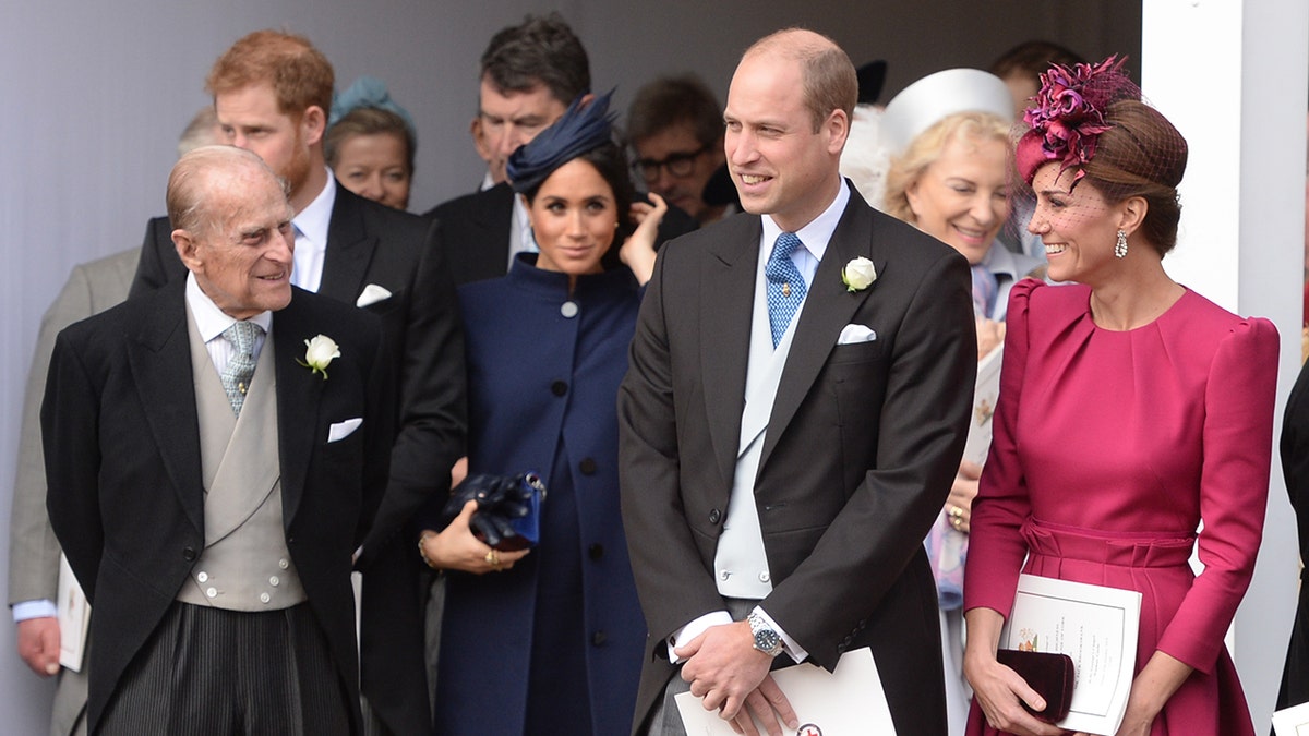 Prince Philip gave Kate Middleton golden rule for surviving the monarchy 11 Kate Middleton smiling at Prince Philip as the other royals walk on.