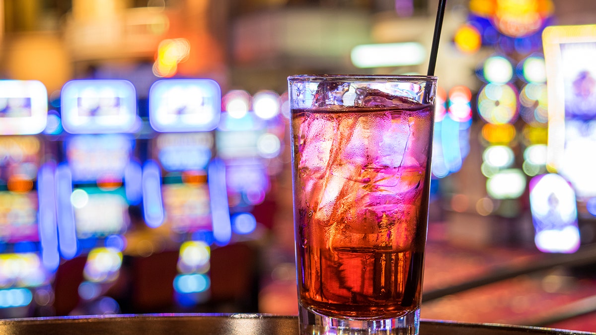 Cocktail seen with slots in background at Vegas casino