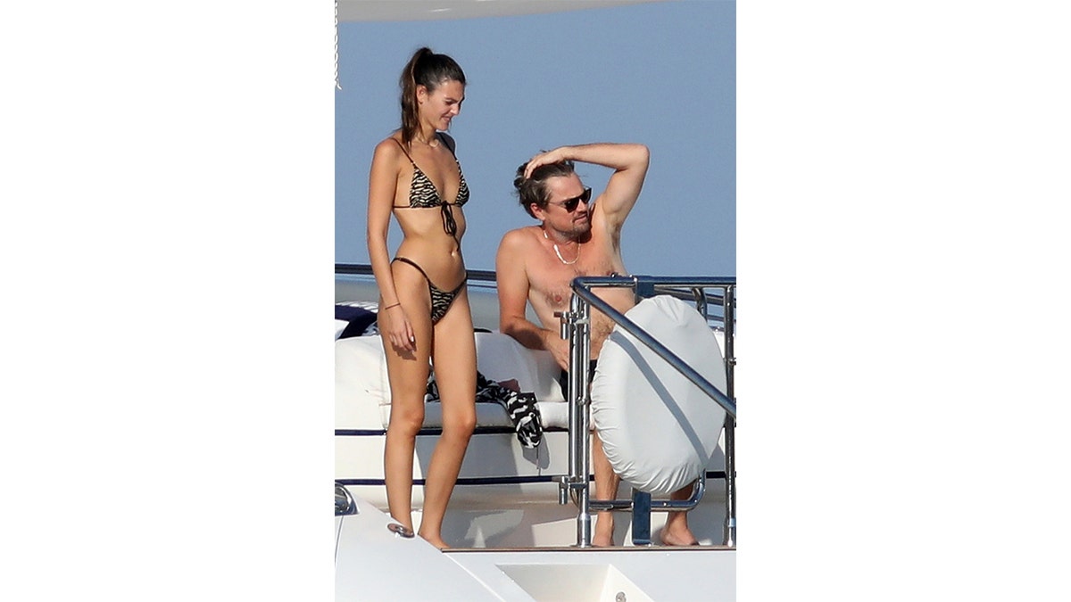 Vittoria Ceretti and Leonardo DiCaprio on a yacht in Spain