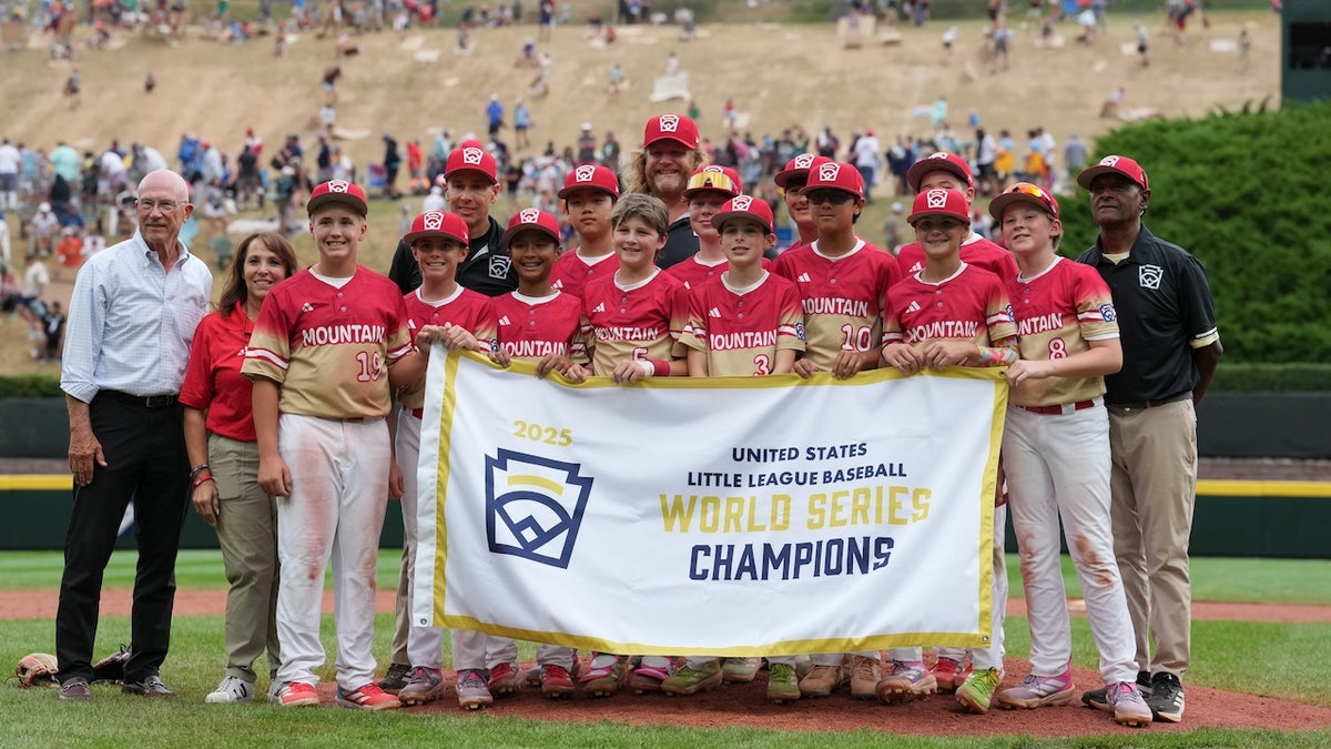 Mountain Region pose with the championship banner after the game against Metro Region at Howard J. Lamade Stadium. Mandatory Credit: Kyle Ross-Imagn Images
