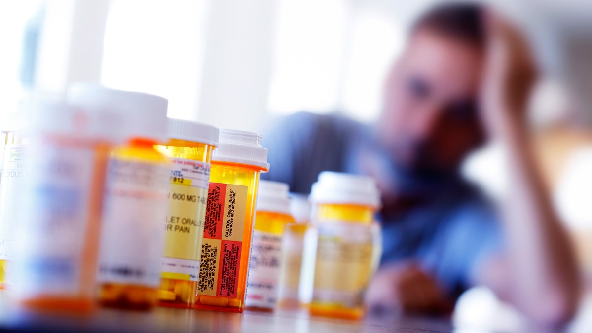 Man taking medications