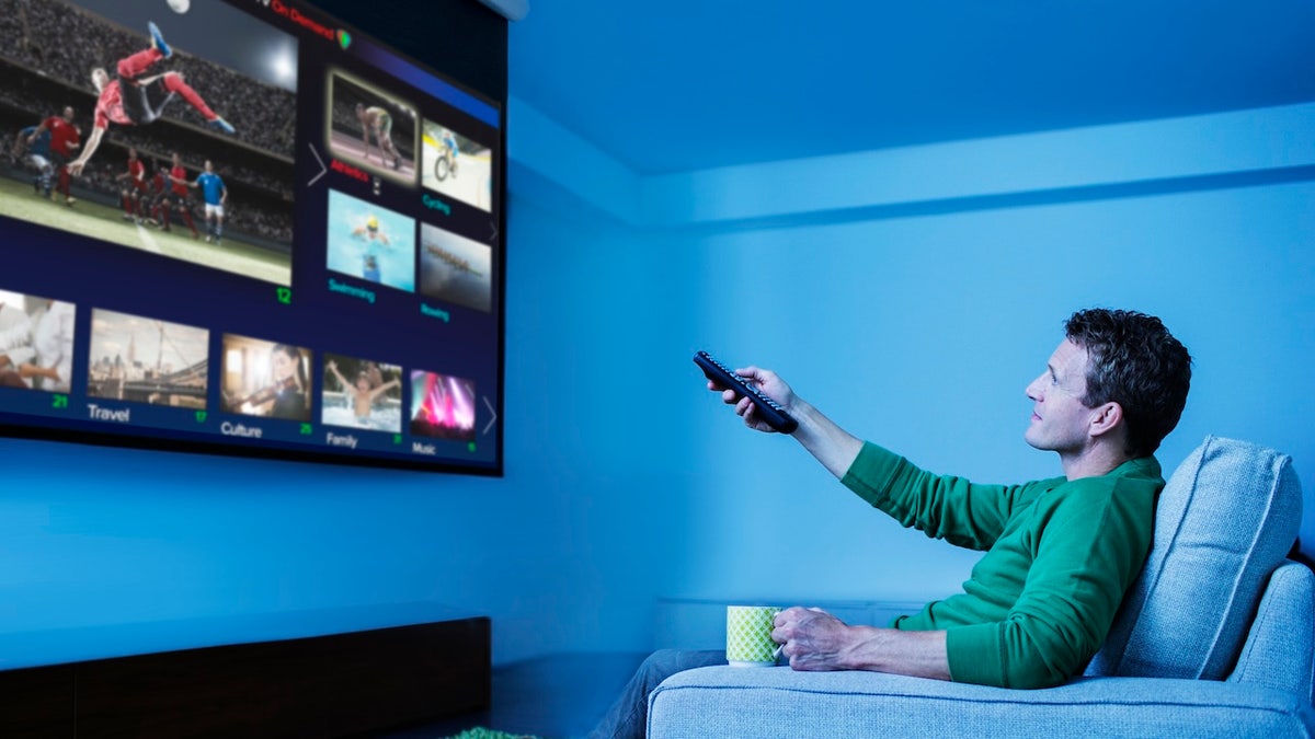 man watching tv