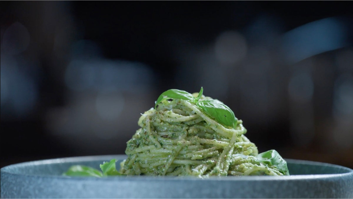 Mealworm pesto is shown up close in a bowl.