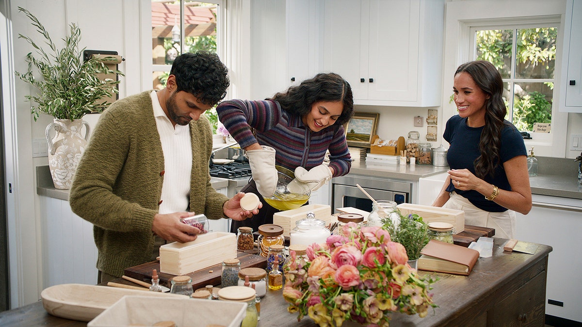 Meghan Markle overseeing two people make a flower arrangement in Season 2 of With Love, Meghan on Netflix.