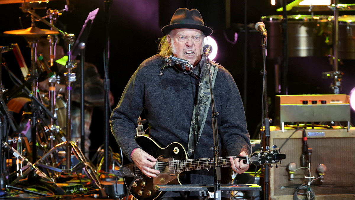 Neil Young blasts Trump DC crackdown as mayor says it actually worked 1 Neil Young performs on stage