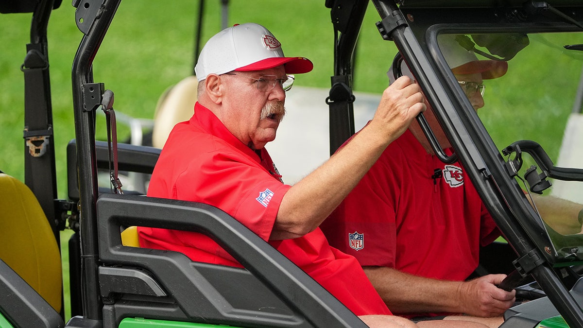Andy Reid with the golf cart