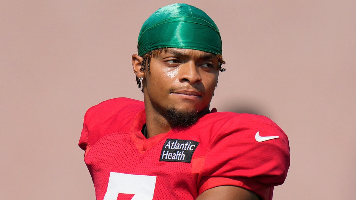 Justin Fields looks on