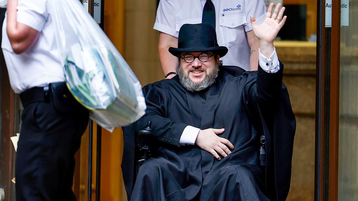 Nicholas Rossi leaves extradition hearing