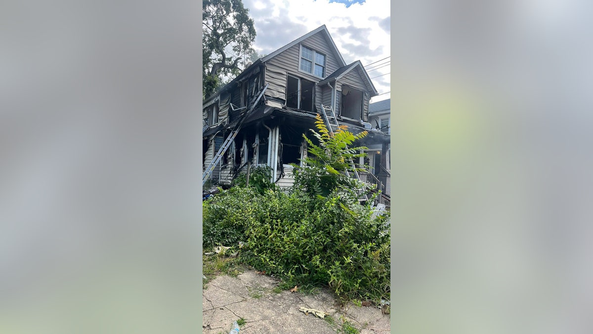 Boy jumps out of NJ burning home