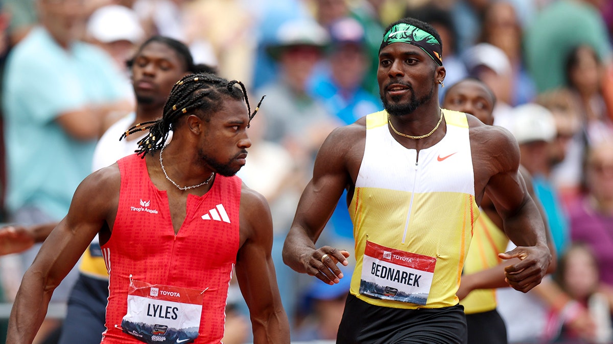Noah Lyles and Kenny Bednarek after race