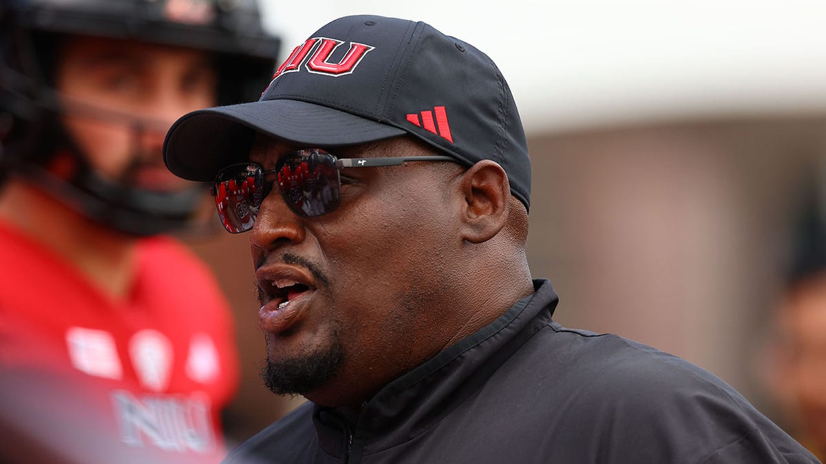 Thomas Hammock coaches a game