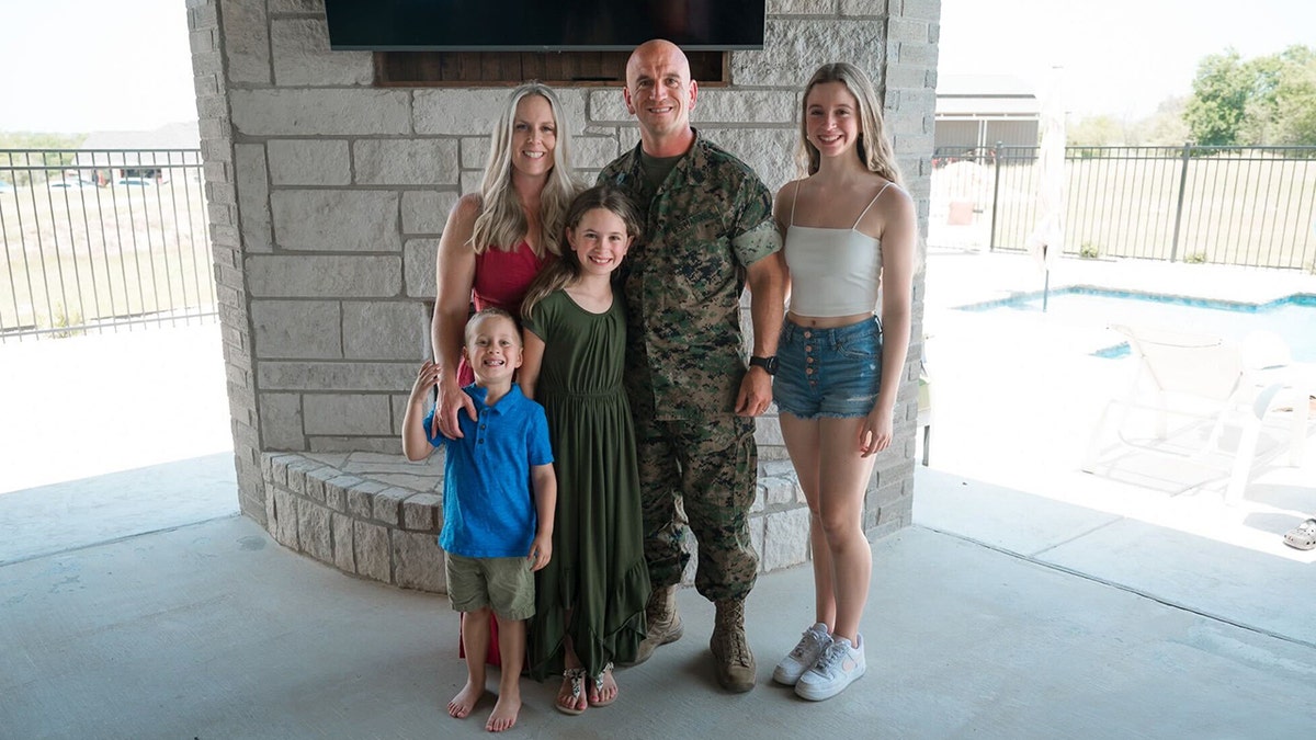 Marine Corps family photo of Jon Ogasian with wife and children