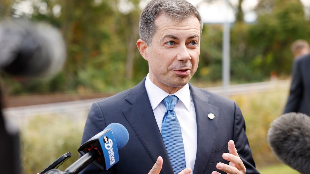 U.S. Secretary of Transportation Pete Buttigieg speaks to reporters after a groundbreaking ceremony for the Long Bridge Project at the Long Bridge Aquatic Center on October 15, 2024 in Arlington, Virginia. With completion targeted for 2030, the Virginia Passenger Rail Authority’s Long Bridge Project plans to add a two track railroad bridge next to the existing Long Bridge across the Potomac River, to alleviate congestion between Arlington, Virginia and Washington DC.