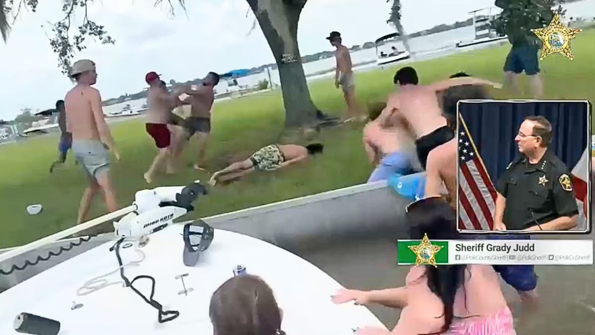 Polk County Sheriff Brady Judd watches video of the wild brawl